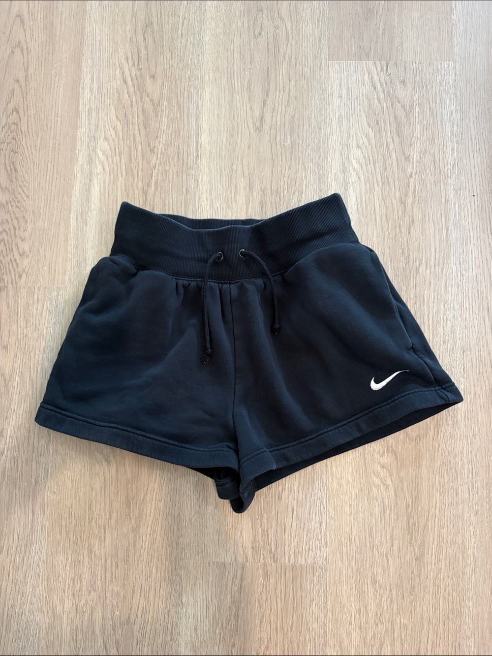 Nike Women’s Black Athletic Shorts with White Swoosh
